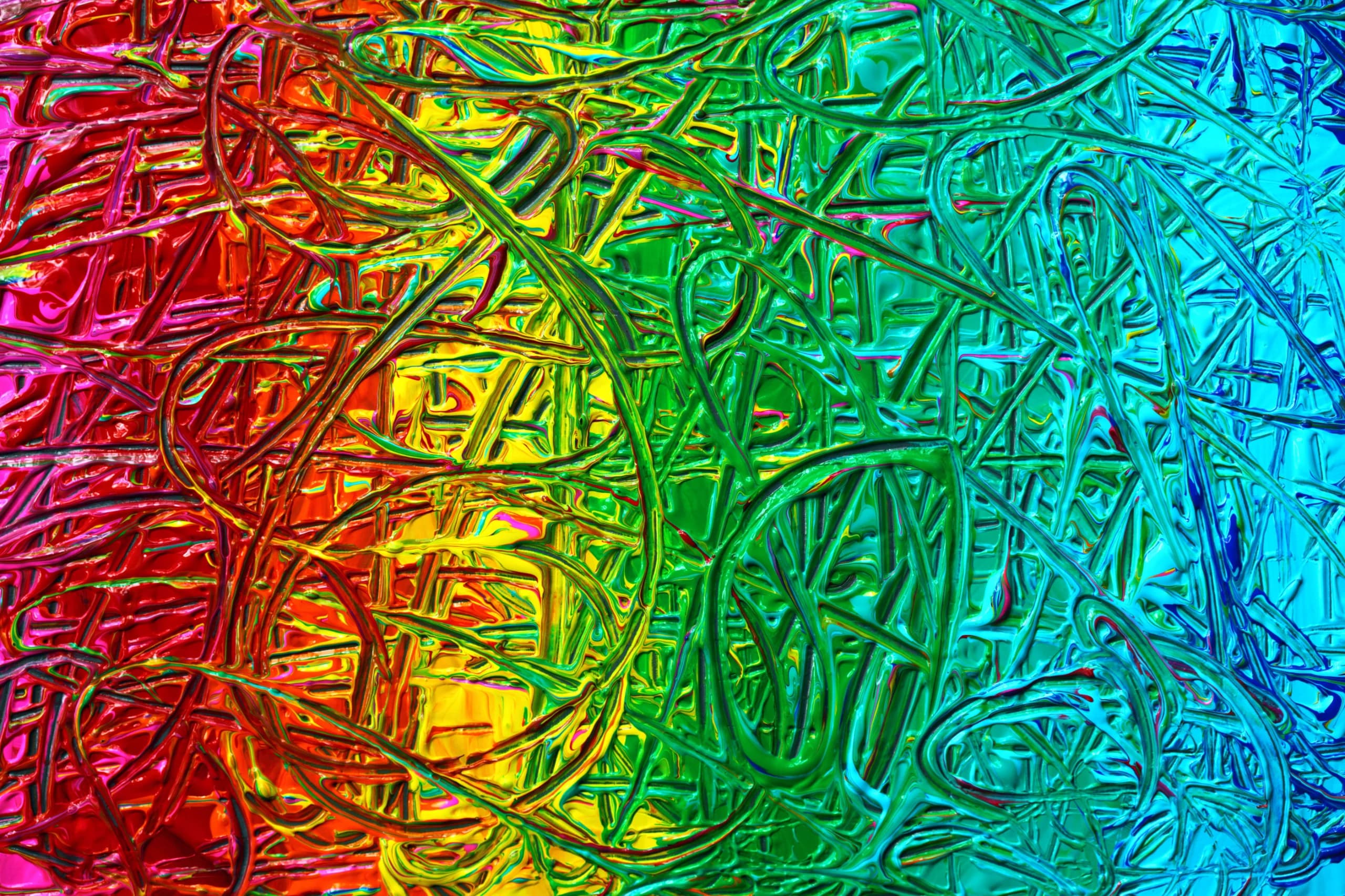A dynamic abstract art piece showcasing a vivid rainbow color palette and intricate textures.