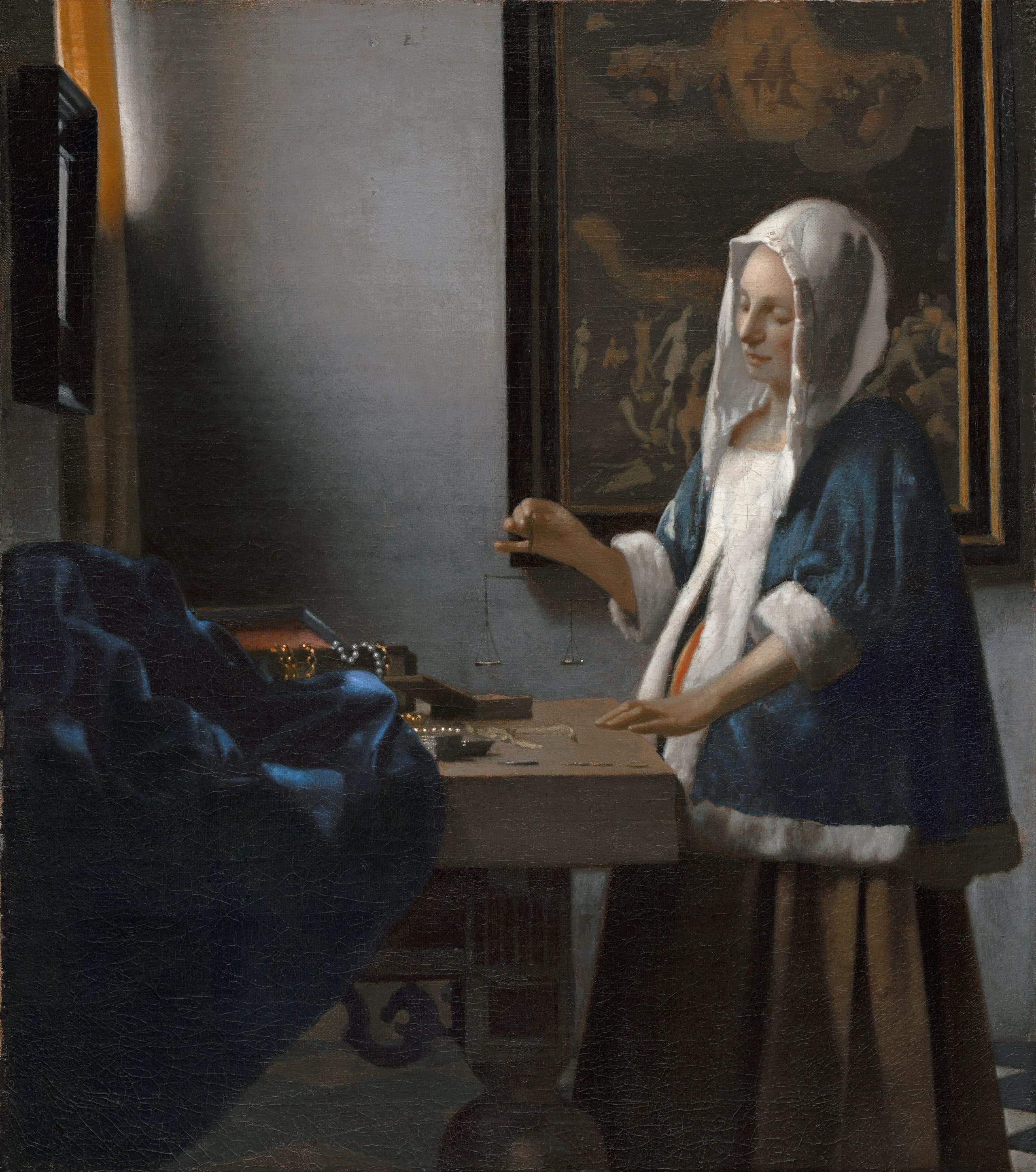 Woman Holding a Balance
